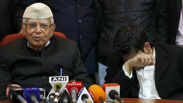File image of Narayan Dutt Tiwari with Rohit Shekhar (R) after accepting him as his son, at a press conference | Arun Sharma/ Hindustan Times via Getty Images