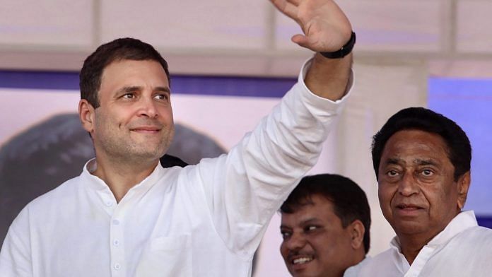 Congress president Rahul Gandhi waves at the crowd at a public meeting in Dhar district, Madhya Pradesh | PTI File Photo