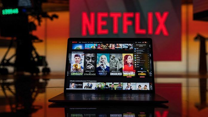 A laptop computer screen displaying the Netflix homepage | Chris Ratcliffe/Bloomberg