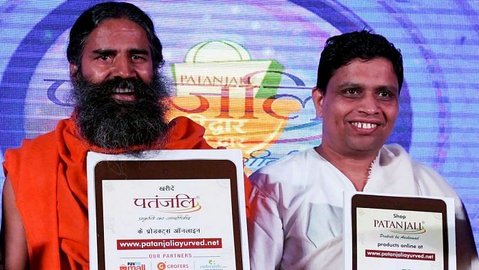 File photo of Baba Ramdev and Acharya Balkrishna | Money Sharma/AFP/Getty Images