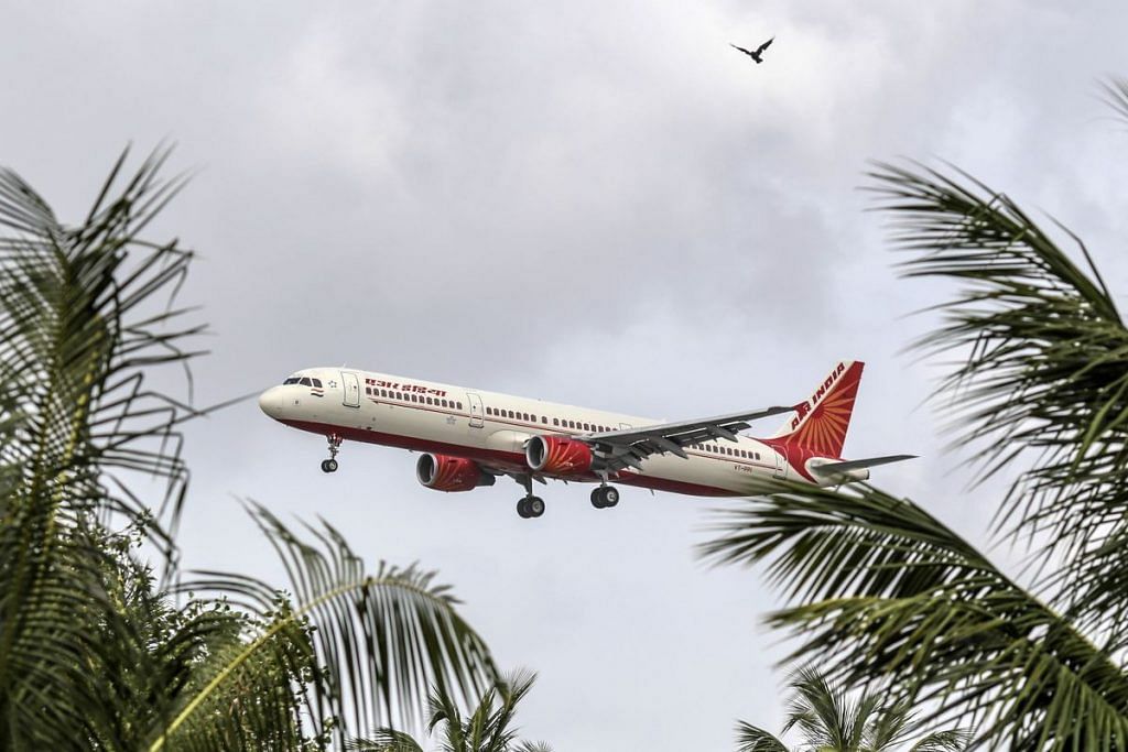 An Air India Ltd. aircraft prepares to land | Dhiraj Singh/Bloomberg