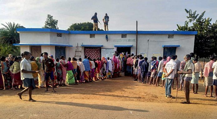 Voters in Chhattisgarh stand in line to cast their ballots | PTI