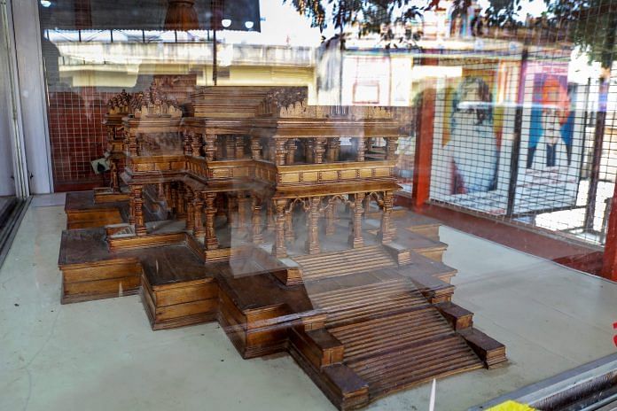 A wooden model of the proposed Ram Mandir in a glass encasement, at the Ram Janmabhomi Nyas-run workshop at Karsevakpuram in Ayodhya | PTI file photo