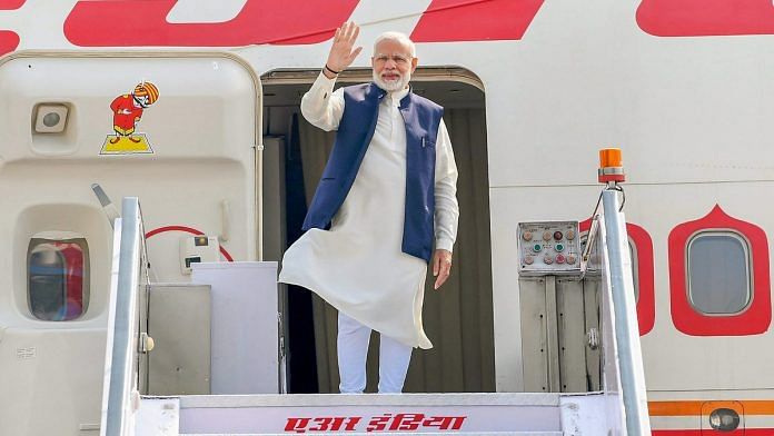 Prime Minister Narendra Modi waves as he emplanes for Maldives to attend the historic swearing-in ceremony of President-elect Ibrahim Mohamed Solih in New Delhi