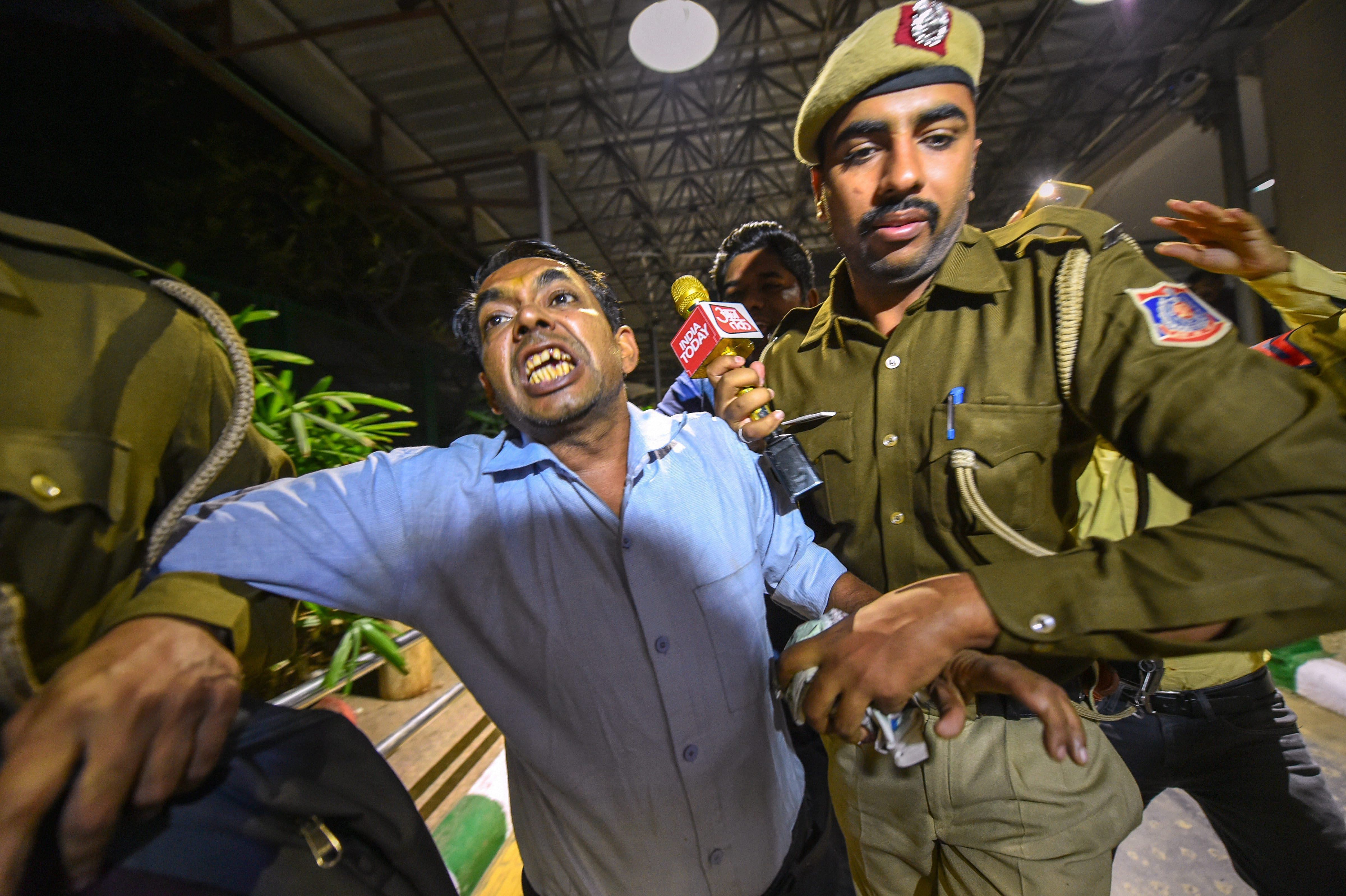 Police detain Anil Kumar | Arun Sharma/PTI