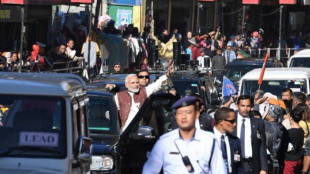 Prime Minister Narendra Modi at an election roadshow in Aizawl, Mizoram | PTI