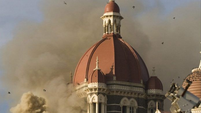 A fire rages in the Taj Mahal Palace and Tower hotel during the 26/11 Mumbai attacks | Prashanth Vishwanathan/Bloomberg News