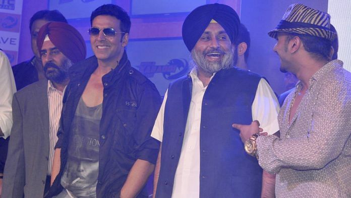 Sukhbir Badal with Akshay Kumar and Yo Yo Honey Singh during the unveiling of league Franchisees names and logos of World Kabaddi league in 2014