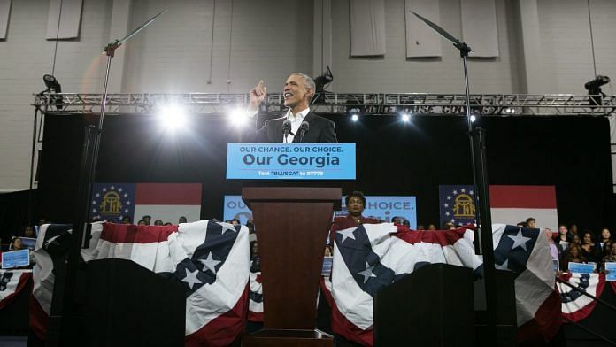 Former US President Barack Obama addresses the crowd in support of Georgia Democratic Gubernatorial candidate Stacey Abrams during a campaign rally on 2 November in Atlanta, Georgia