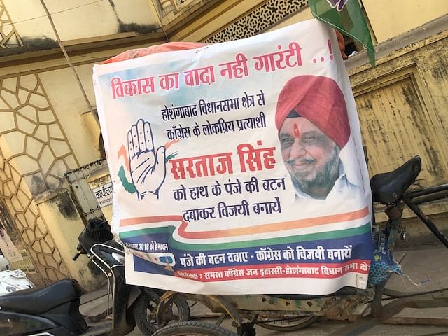 A poster of Congress leader Sartaj Singh | Ruhi Tewari/ThePrint
