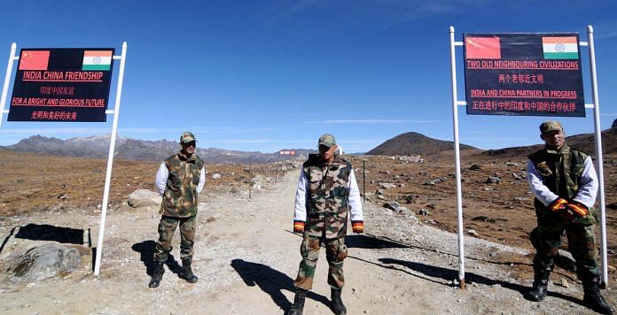 Indian Army personnel keep vigilance at Bumla pass in Arunachal Pradesh | BIJU BORO/AFP/Getty Images