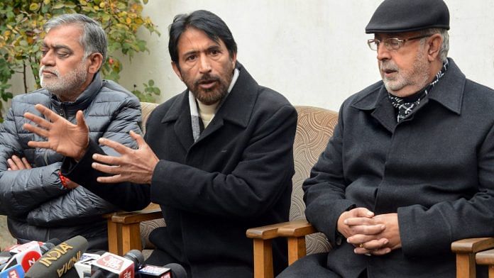 J&K Congress president Ghulam Ahmad Mir (C) with senior party leaders address a press conference regarding the dissolution of Assembly, in Srinagar | PTI