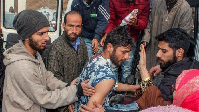 An injured civilian being taken for treatment in Srinagar on Sunday, Nov. 25, 2018
