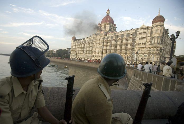 Police personnel outside the Taj Mahal Hotel during the siege by terrorists in Mumbai, on 25 November 2008 | Prashanth Vishwanathan/Bloomberg