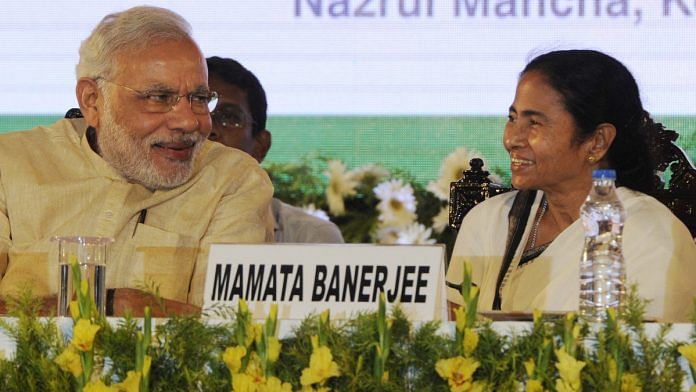 Prime Minister Narendra Modi and West Bengal CM Mamata Banerjee | Ashok Nath Dey/Hindustan Times via Getty Images
