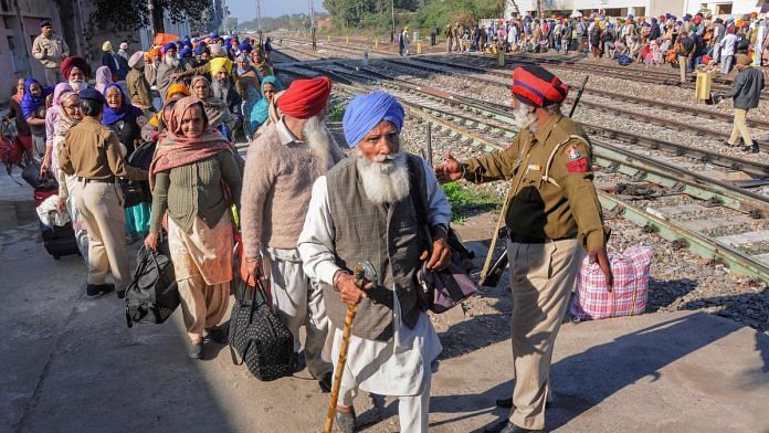 Sikh pilgrims leave for Pakistan on a special train to celebrate the 550th birthday anniversary of Guru Nanak | PTI