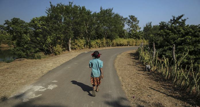 A girl in rural India | Dhiraj Singh/Bloomberg