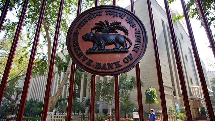 RBI logo displayed on a gate at the central bank's headquarters in New Delhi | Bloomberg/Bloomberg