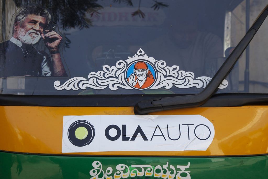 Promotional stickers for ride-hailing service Ola