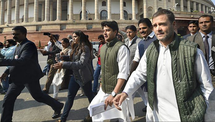 Congress President Rahul Gandhi with party MP Jyotiraditya Scindia during the Winter Session of Parliament