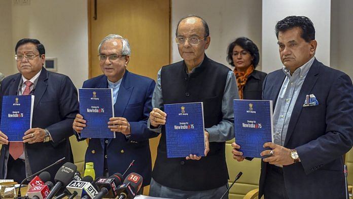 Arun Jaitley with NITI Aayog Vice Chairman Rajiv Kumar and CEO Amitabh Kant (R) release NITI Aayog's Strategy Document for New India@75