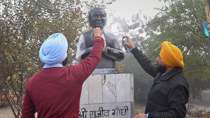 Youth Akali Dal members blacken the statue of Rajiv Gandhi in Ludhiana | PTI