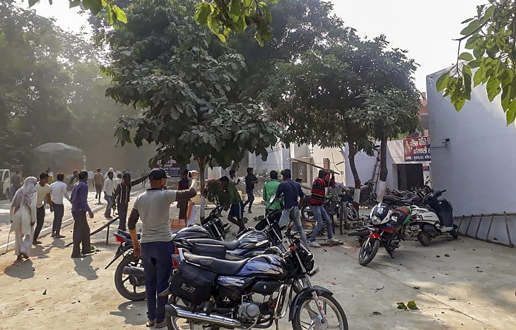 A mob pelts brickbats during a protest over the alleged illegal slaughter of cattle, in Bulandshahr, on 3 December 2018 | PTI