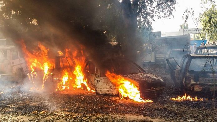 Vehicles set on fire by a mob during a protest over the alleged illegal slaughter of cattle in Bulandshahr | PTI