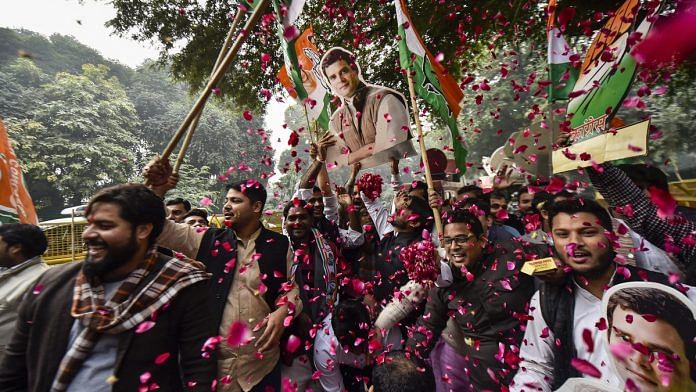 Congress party workers celebrate outside the party headquarters in New Delhi | Ravi Choudhary/PTI