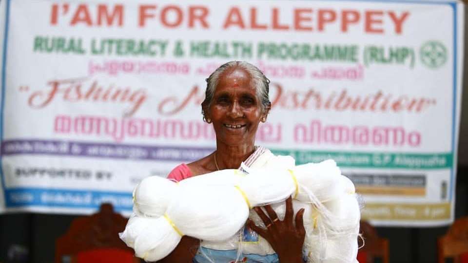 Facebook page 'I Am Allepey' features a woman receiving fishing net | Facebook