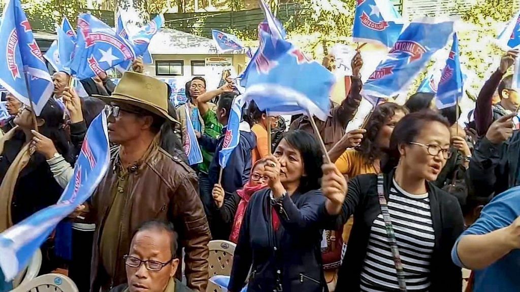 MNF workers hold celebrate the party's victory in the Assembly elections in Aizawl | PTI
