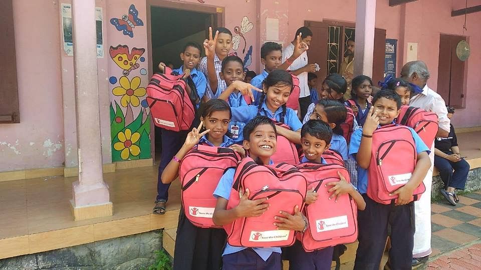 Students receive school kits from several organisations | Facebook