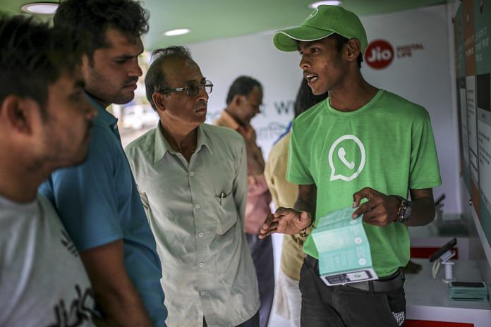 Facebook and Reliance Jio are teaming up to draw hordes of customers with cheap phones, rock-bottom rates and handy messaging services. Dhiraj Singh/Bloomberg