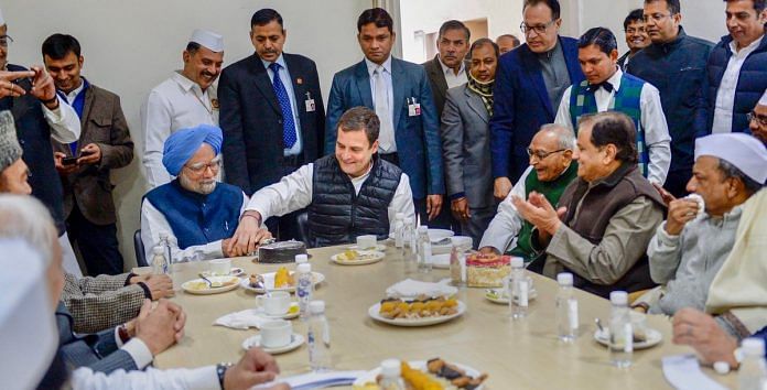 Rahul Gandhi with former prime minister Manmohan Singh cut a cake to celebrate the 134th Congress Foundation Day, at the party HQ in New Delhi
