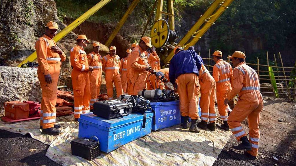NDRF personnel conduct a rescue task at the site of a coal mine collapse at Ksan, in Jaintia Hills district of Meghalaya