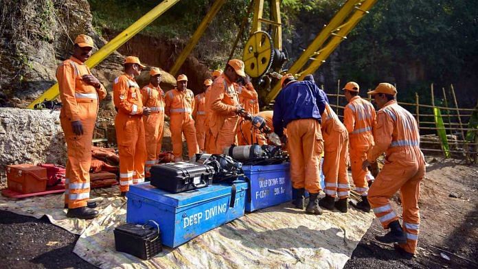 NDRF personnel conduct a rescue task at the site of a coal mine collapse at Ksan, in Jaintia Hills district of Meghalaya