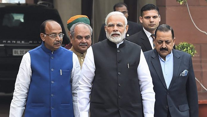 Prime Minister Narendra Modi with his ministers ahead of the Winter Session of Parliament