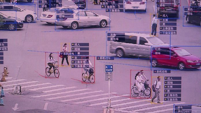 A screen shows a demonstration of SenseTime Group Ltd.'s SenseVideo pedestrian and vehicle recognition system at the company's showroom in Beijing, China