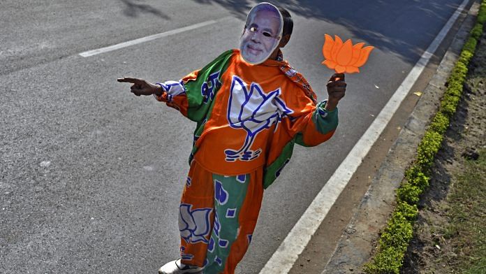A BJP supporter of the Bharatiya Janata Party | Anindito Mukherjee/Bloomberg