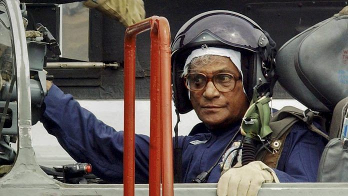 In this file photo George Fernandes is seen inside the cockpit of an MiG-21 after completing a sortie, at Ambala Air Force Station
