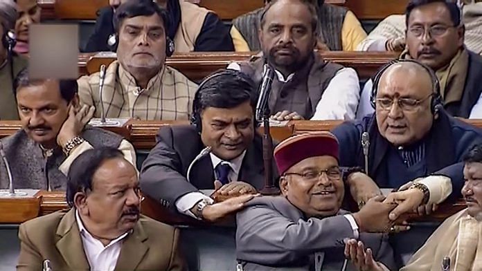 Social Justice minister Thawarchand Gehlot and other MPs after Lok Sabha passed the 10 per cent quota bill | PTI