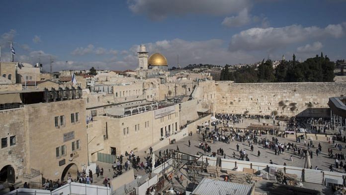 The Western Wall with the Dome of the Rock visible on the skyline in Jerusalem | Hope Ghelli/Bloomberg