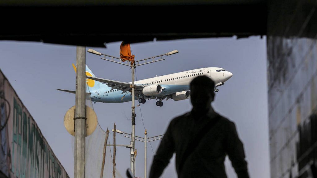 A Jet Airways India Ltd. aircraft prepares to land at Chhatrapati Shivaji International Airport in Mumbai