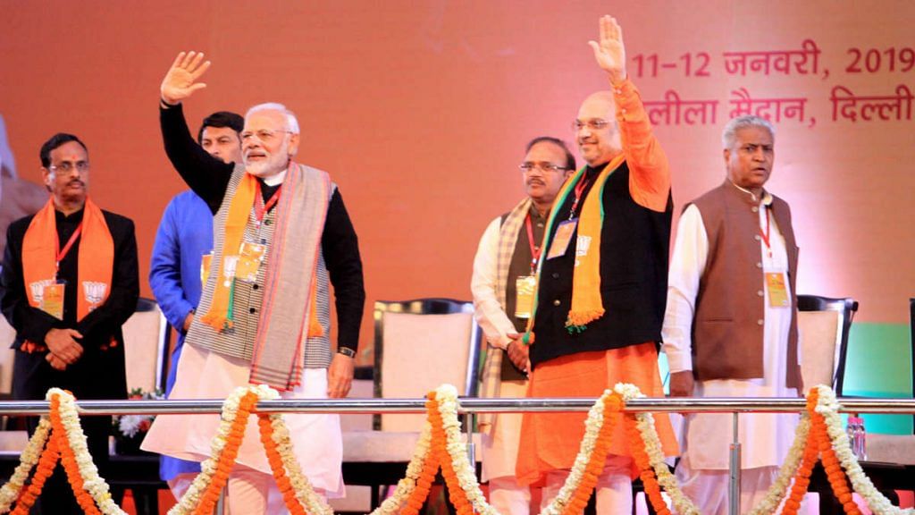 PM Modi (L) with Amit Shah and other BJP leaders at the BJP National convention in New Delhi