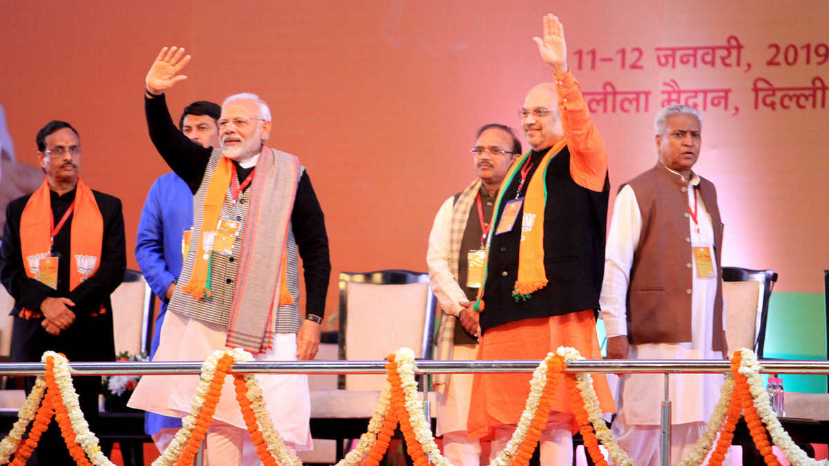 PM Modi (L) with Amit Shah and other BJP leaders at the BJP National convention in New Delhi