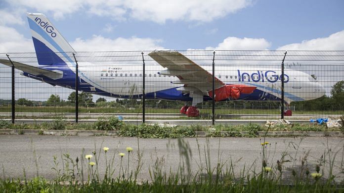 A protective cover sits on a wing engine fitting of an undelivered Airbus A320neo passenger jet operated by IndiGo | Balint Porneczi/Bloomberg