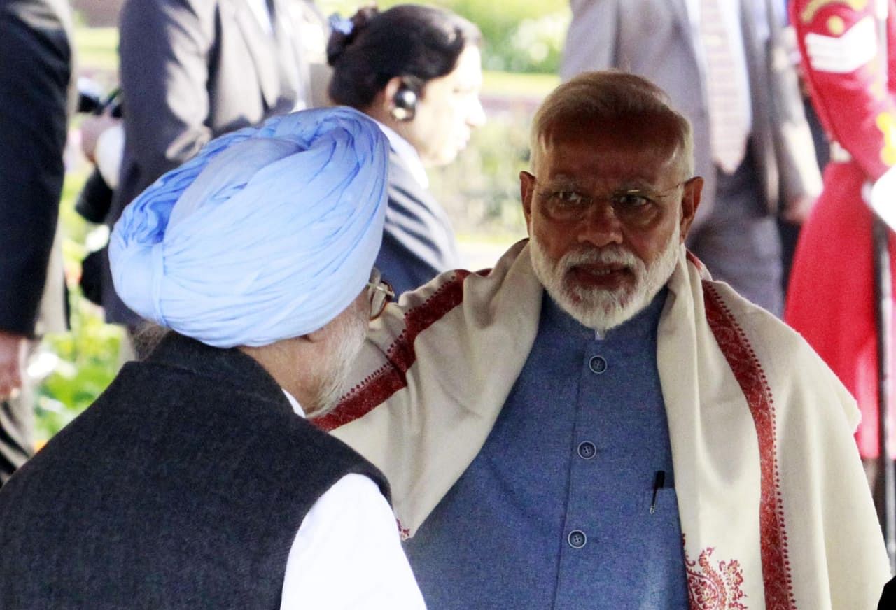 Prime Minister Narendra Modi with former PM Manmohan Singh at the event | Praveen Jain/ThePrint