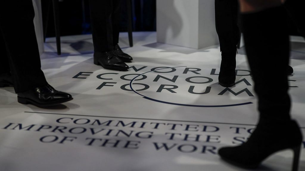 Attendees at World Economic Forum meet in Davos | Jason Alden/Bloomberg