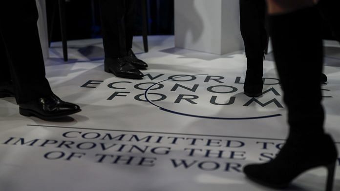 Attendees at World Economic Forum meet in Davos | Jason Alden/Bloomberg