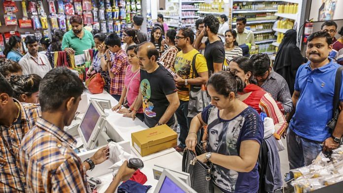 Customers in a departmental store in Mumbai | Dhiraj Singh/Bloomberg